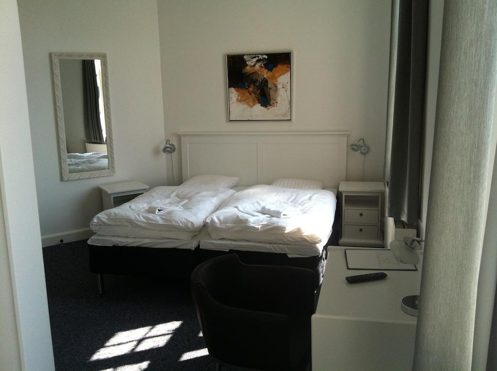 Hotel Posthuzed Рённе Номер фото