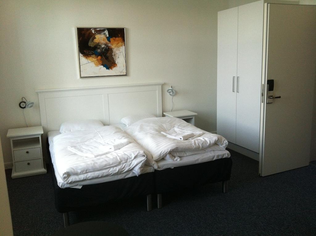 Hotel Posthuzed Рённе Номер фото